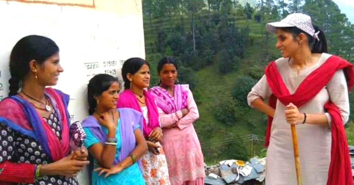 District Magistrate Sonika with residents of Pujaldi village in Tehri Garhwal village. (Source: Facebook/Bharat Bhushan Lekhwar)