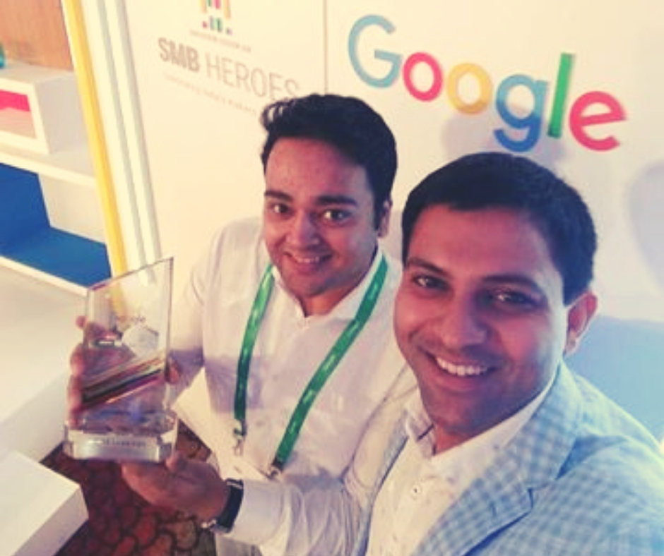 With their award from Google India. 