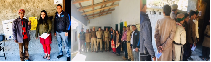 Namami with pol officials and voter on voting day. 