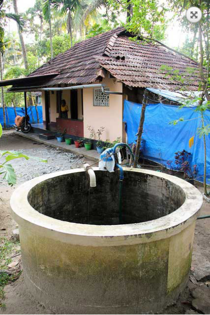 Rainwater is diverted from the tiled roof into the dug well within the premises.