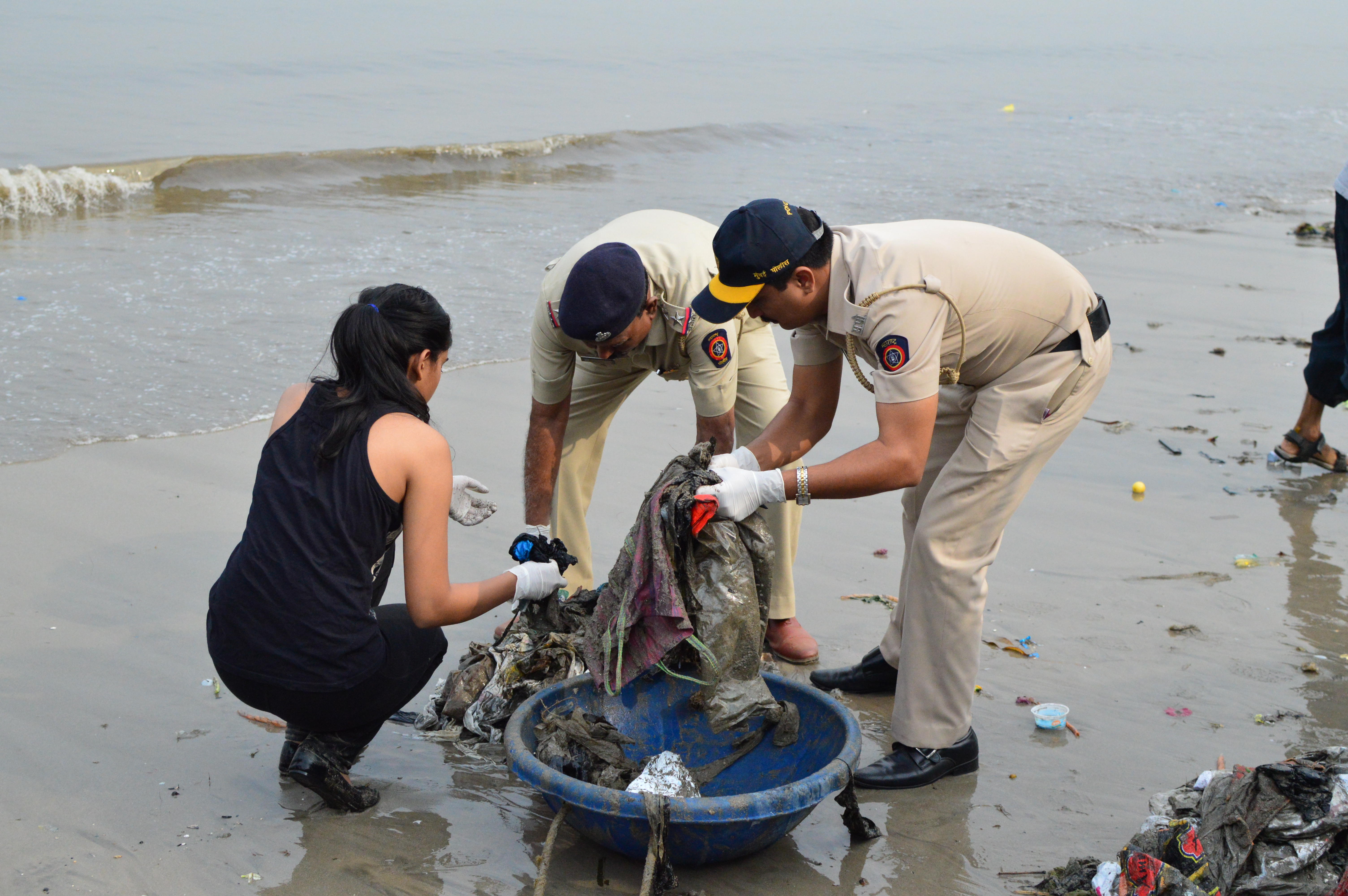 Local officials helping in the beach cleaning drive. (Source: Beach Please)