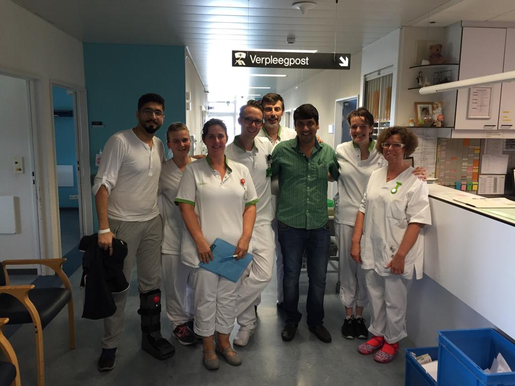 Amit, Sachin and the medical staff at the hospital in Antwerp that did a remarkable job fixing his body and saving his eyesight. (Source: Amit Motwani)