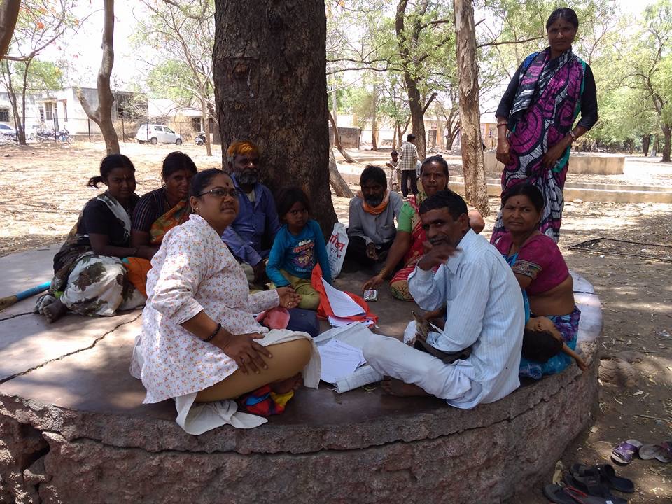 Spreading the word: Sunita during a gathering with some village folk. 