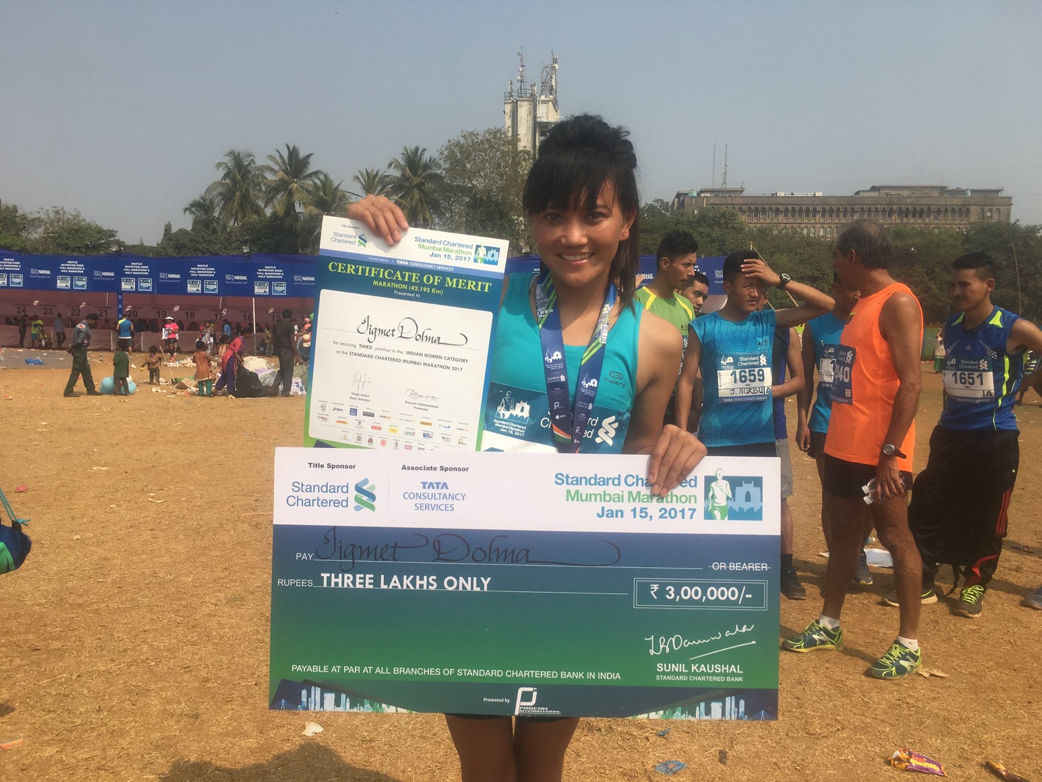 Jigmet Dolma with her prize money following the Mumbai Marathon. (Source: Ladakh Marathon)