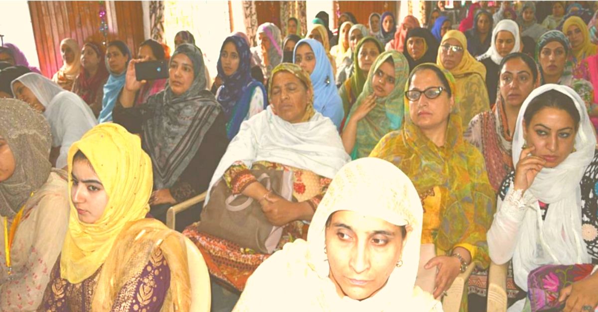 Women of all age groups attending a menstrual health awareness session. 