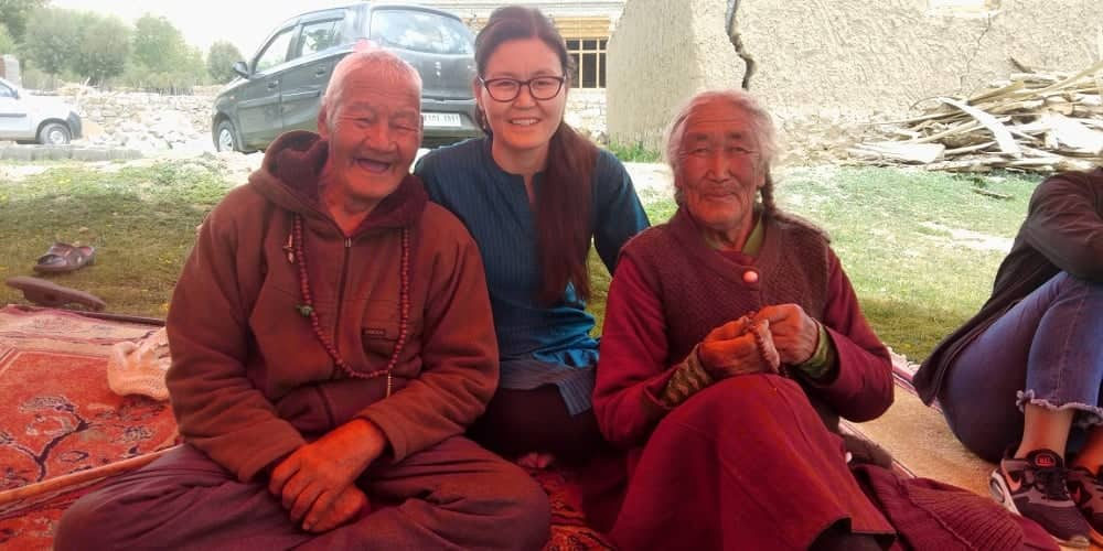 Tashi Pambar Siaser (Extreme Left), his granddaughter Tsetan Dolkar and his wife and partner in the tree plantation drive Tsering Dolkar. (Source: Tsetan Dolkar)