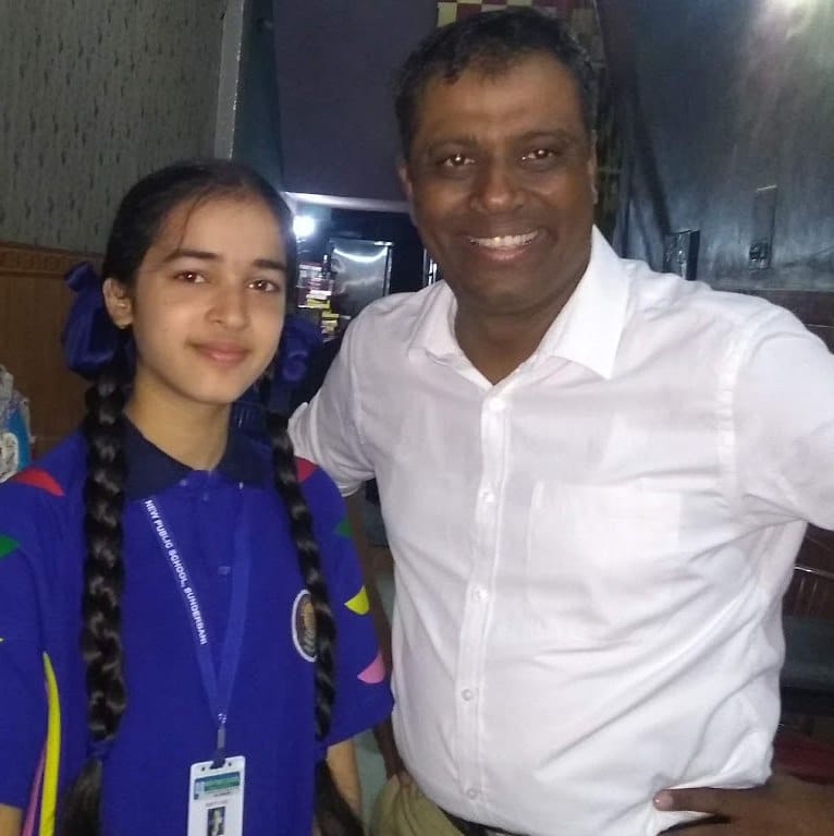 Colonel Shankar standing with Niharika. 