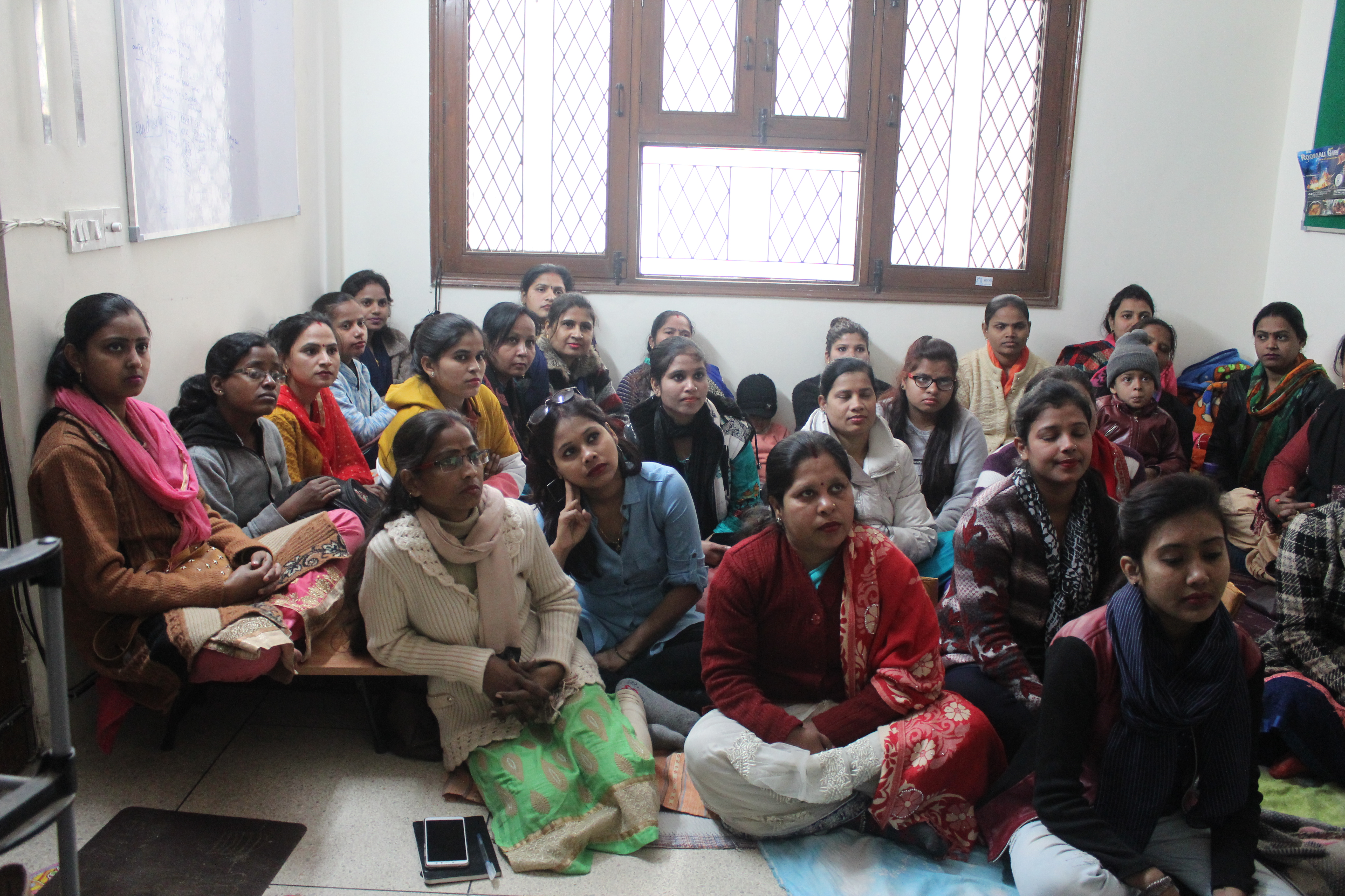 The field team at Saarthi assisting mothers in different colonies across Delhi. (Source: Saarthi)