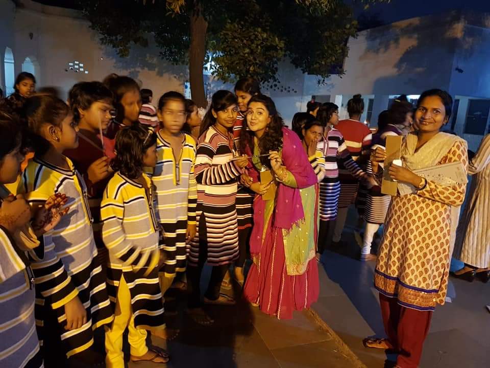 Poulomi Shukla (2nd from Right) at a Diwali celebration party with orphans at an orphanage. 