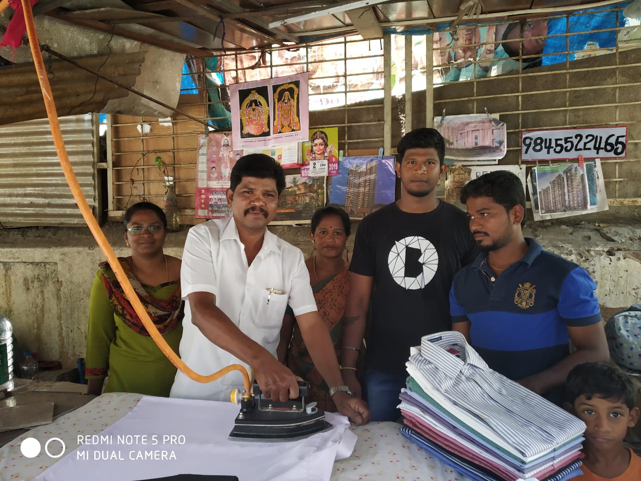 Using the LPG-based iron box. (Source: Udhyam Learning Foundation)