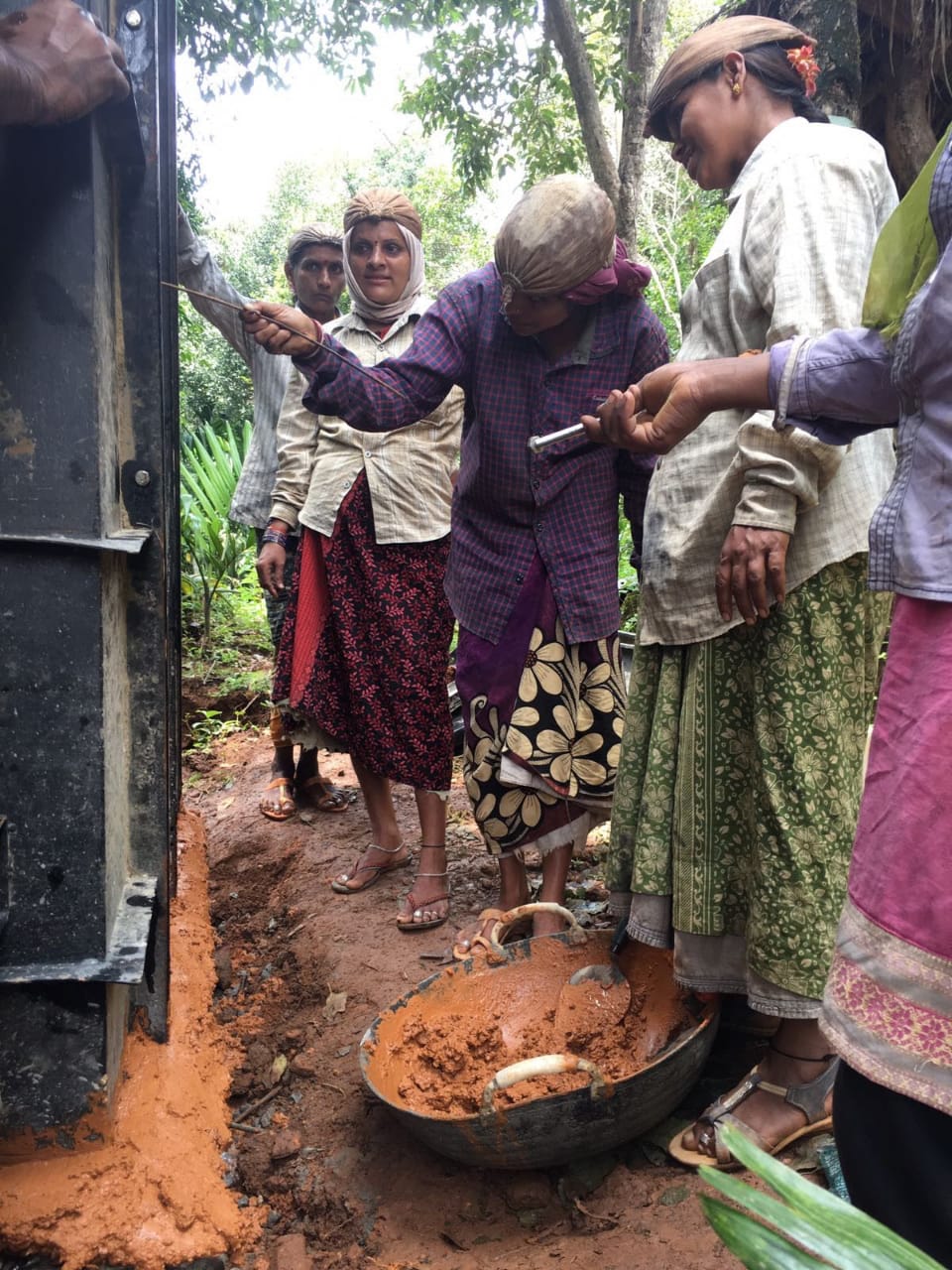 Training women to construct toilets. (Source: AMMACHI Labs)