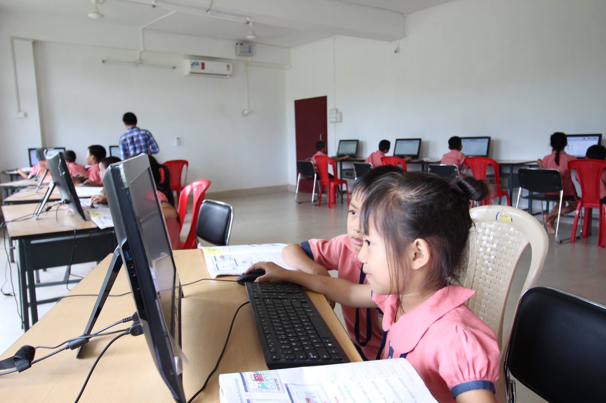 Children learning at the residential school in Tuli. (Source: Community Educational Centre Society