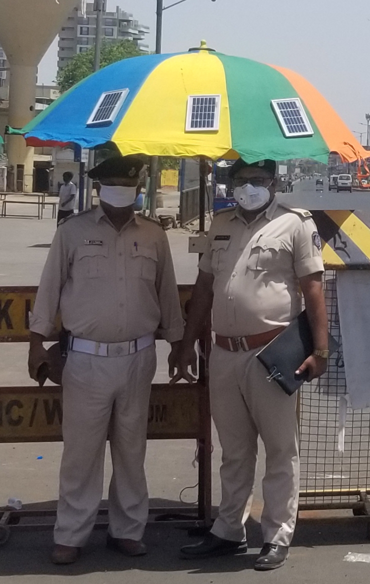 Beating The Heat With Innovation: 23-YO Designs Solar-Powered Umbrellas For Ahmedabad Cops