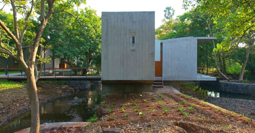 Nature-Loving Architects Build Sustainable House With a Stream Running Through It