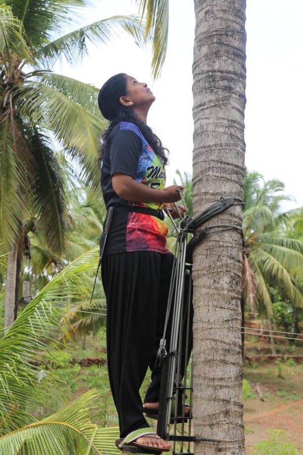 Smashing Gender Norms,Woman Climbs Coconut Trees to Support Family