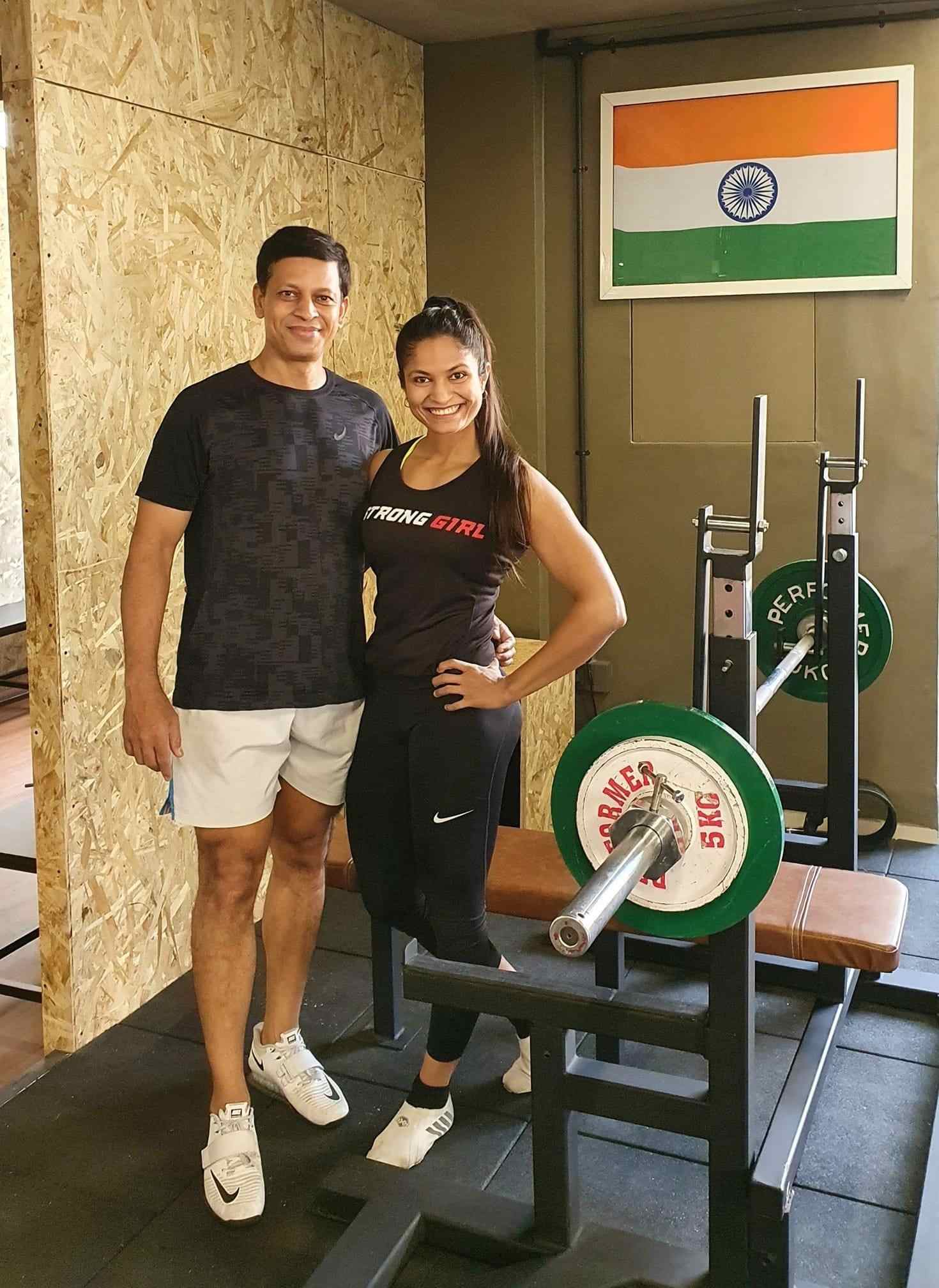 Pune woman working out in a saree