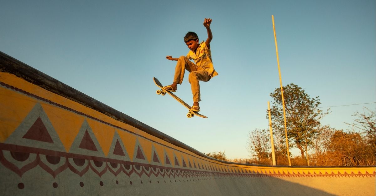 Naresh Bhil, a skateboarding champion in Khempur 