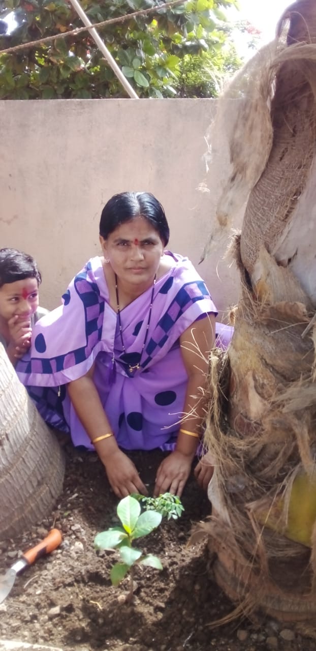 Kalavati Pawar planting crops