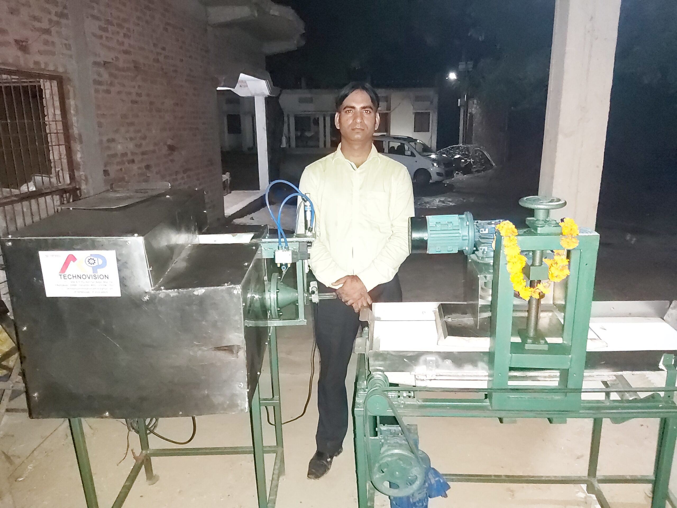 Anand Pandey with his laddu-making machine