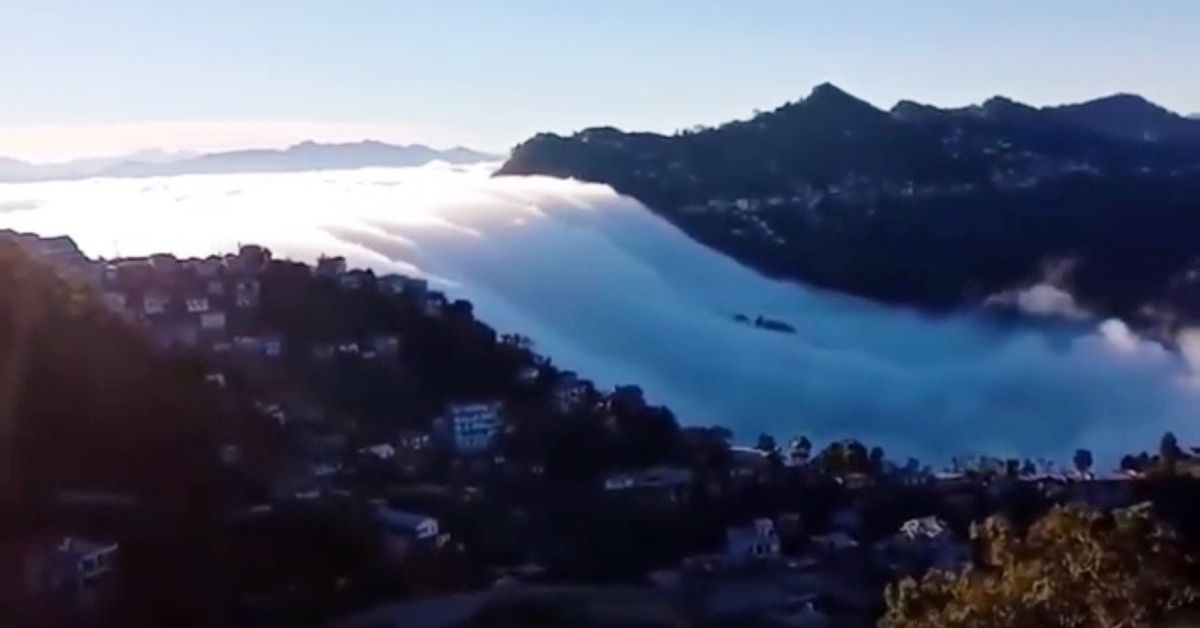 Clouds flowing down the mountains