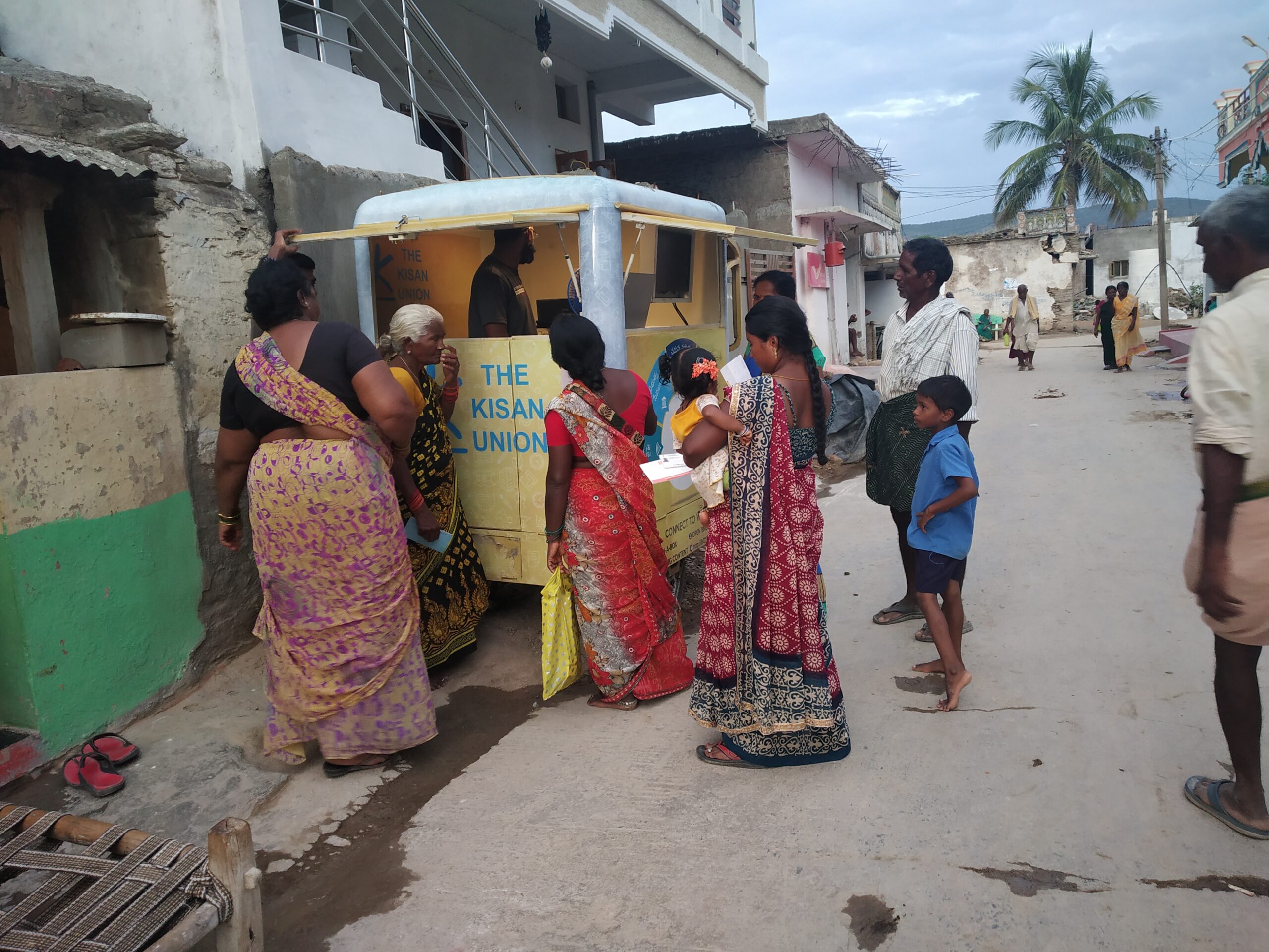 Residents of Anumpalli accessing the smart kiosk.