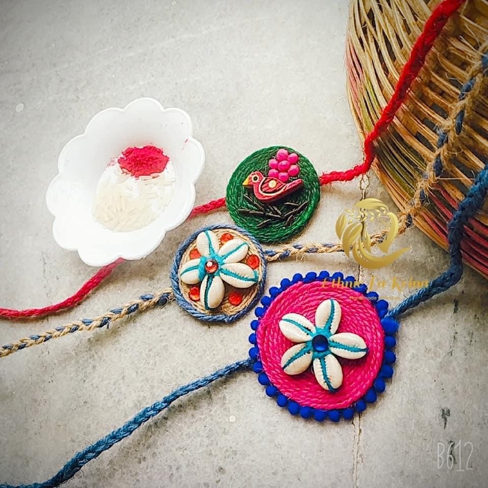 Handmade rakhis with jute and cowrie shells