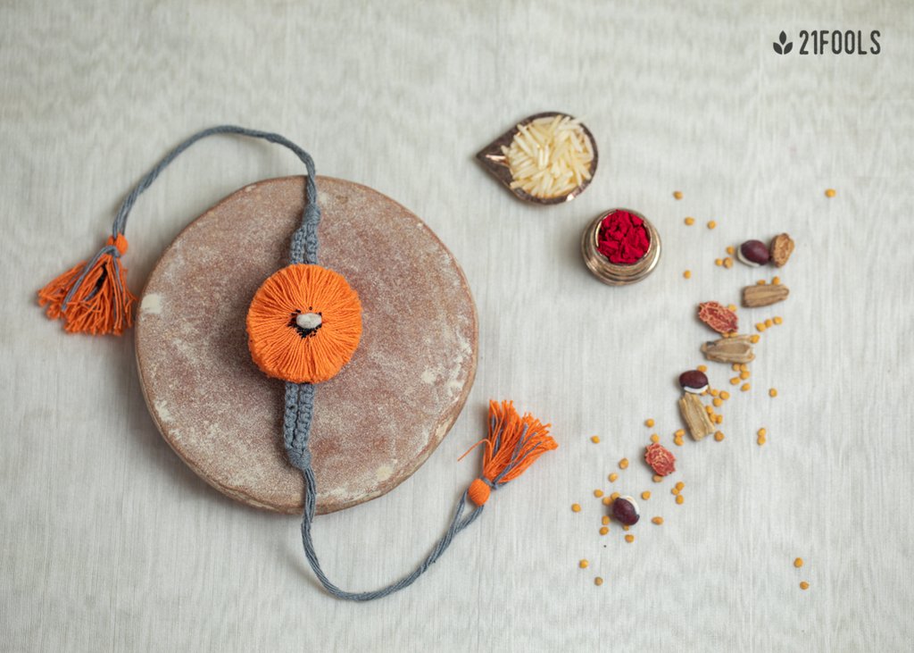 Cotton rakhis embedded with seeds.