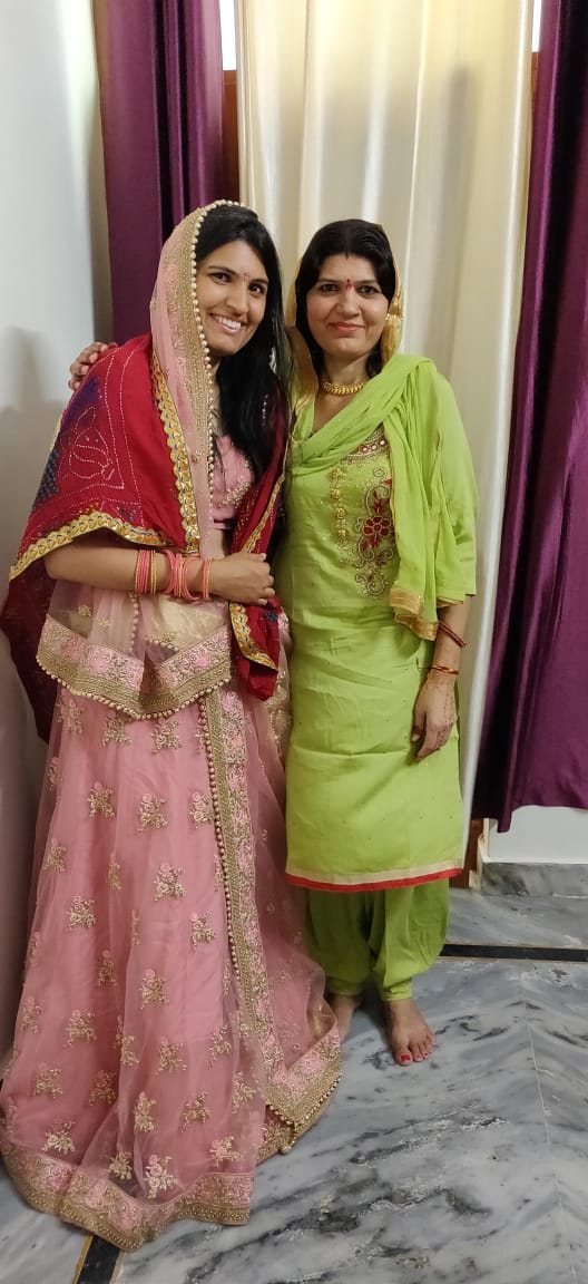 IAS Nidhi Siwach with her mother