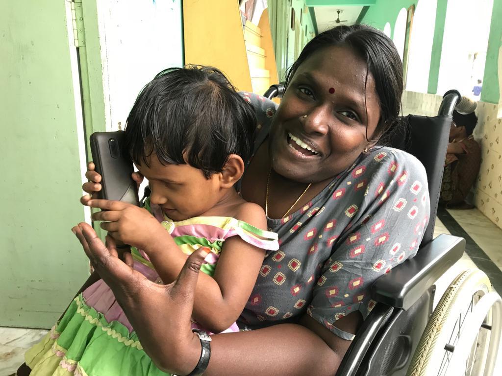 Indra with a kid in Prem Illam