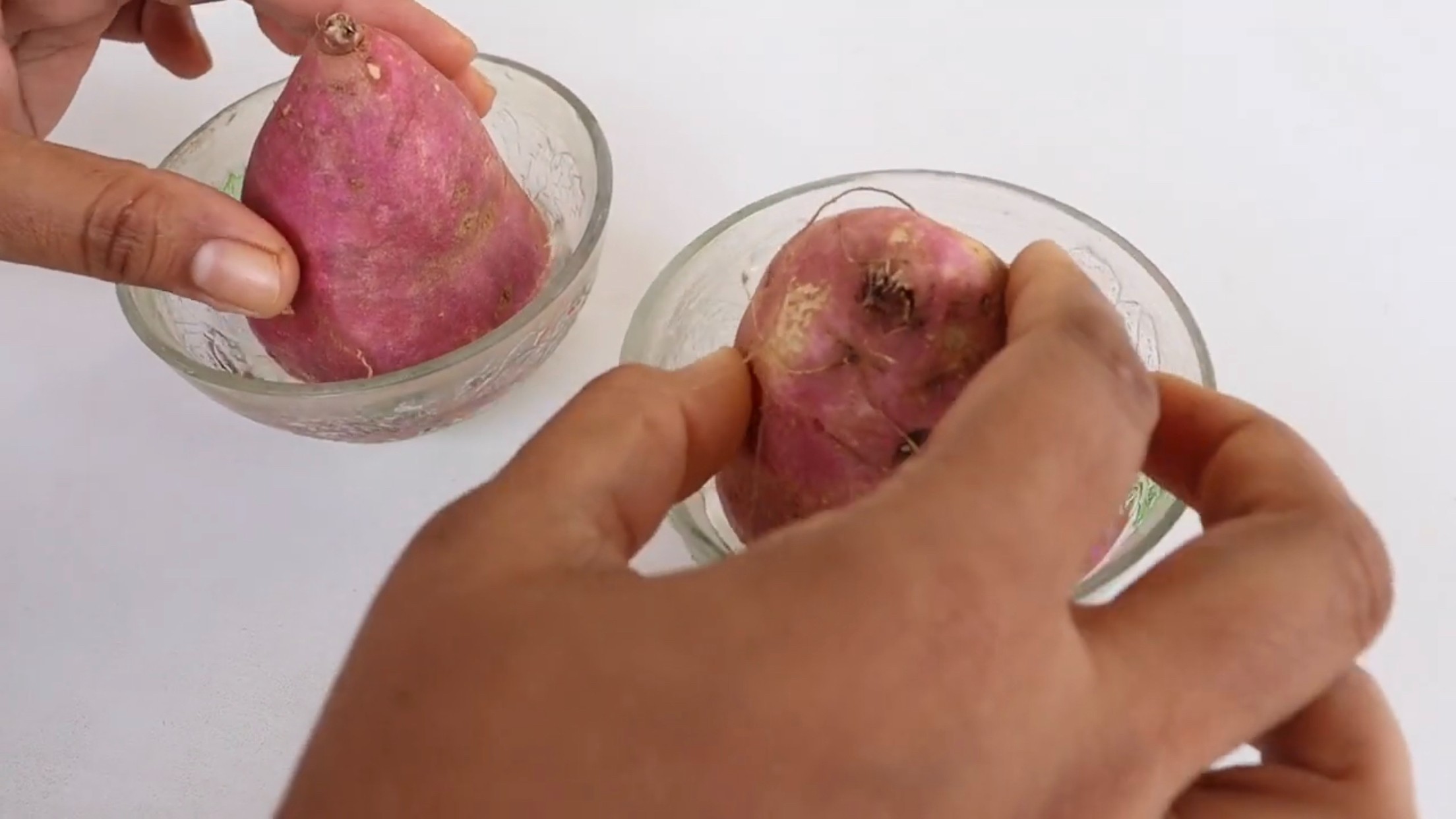 Place two halves in separate bowls filled with water