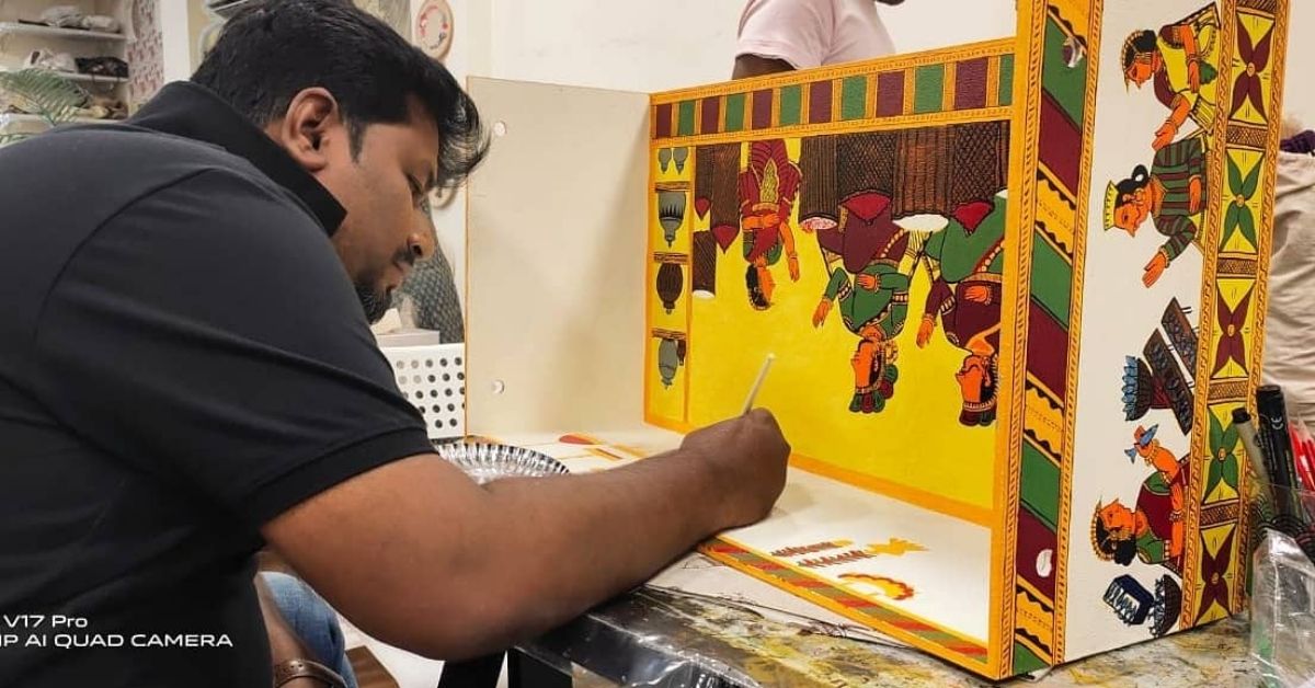 Chetan prepares Chitrakathi painting bundle 