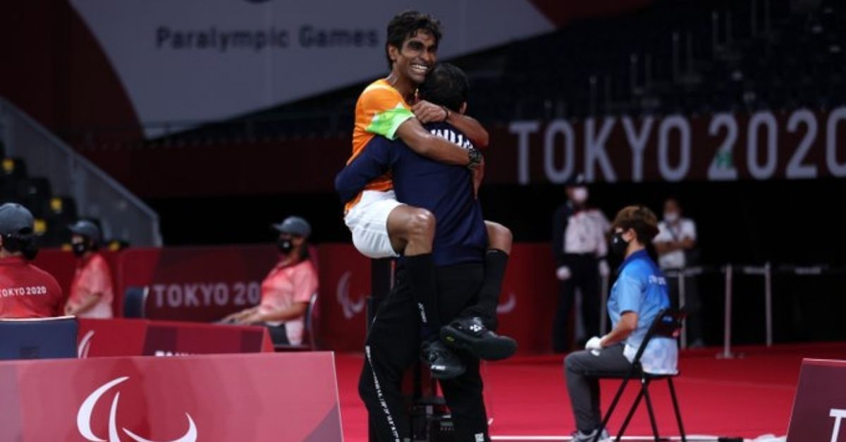 Pramod with his coach, Gaurav Khanna post the match