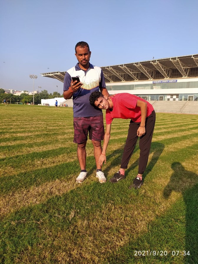 Lokesh Kumar with his coach Vipin Kumar