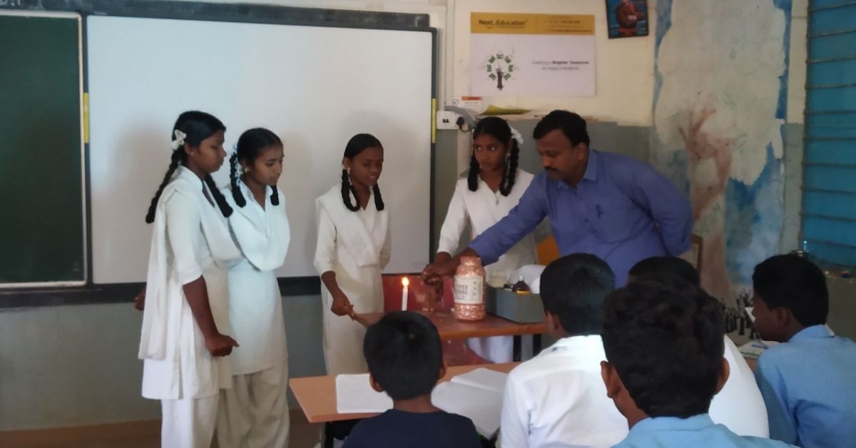 Nagaraja with his students in class