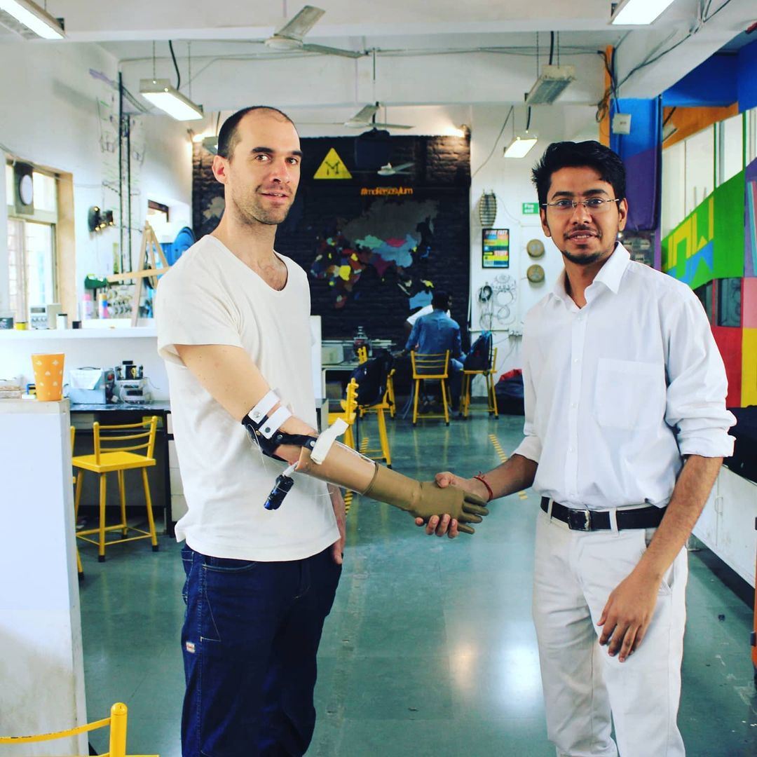 Prashant Gade of Inali Foundation with a recipient of Inali arms. Source: Prashant Gade/Instagram