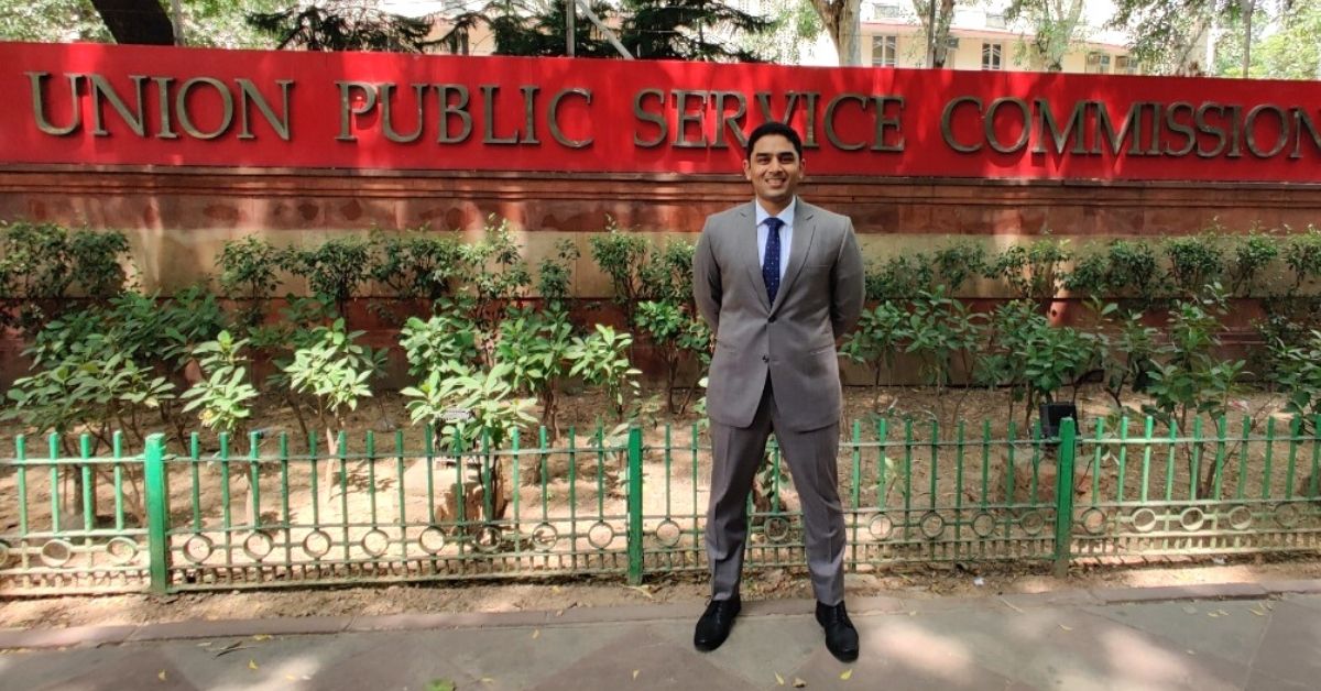 Prateek Rao standing outside the UPSC Office building in Delhi. High scorer in Essay