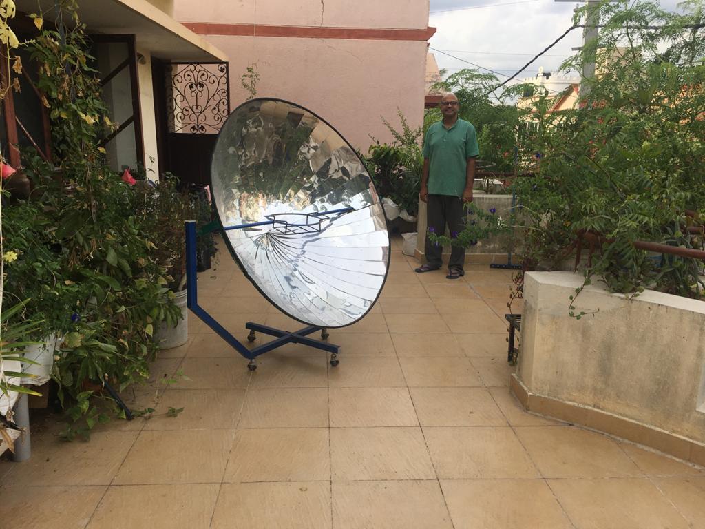 A parabolic solar cooker on the terrace