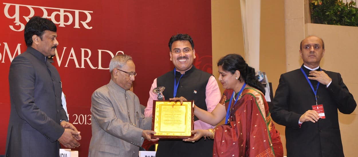 Receiving the National Award from Pranab Mukherjee