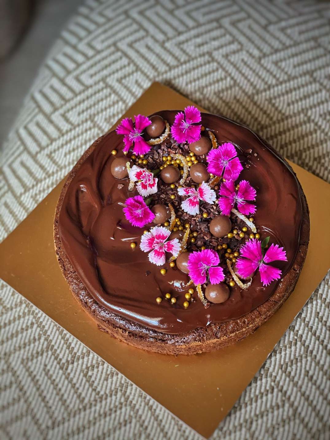 chocolate cake with edible flowers 