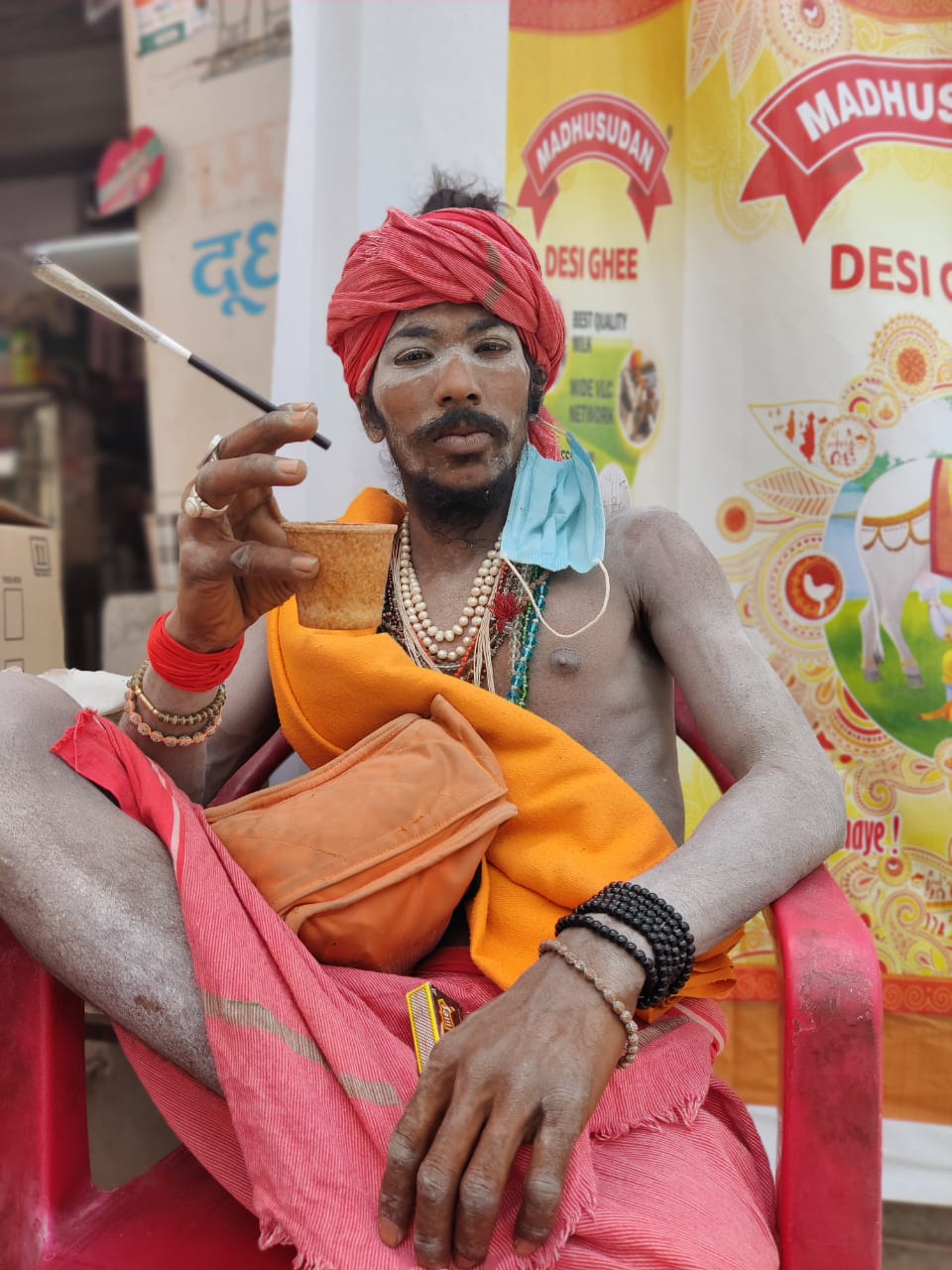 A sadhu enjoying his cup of chai