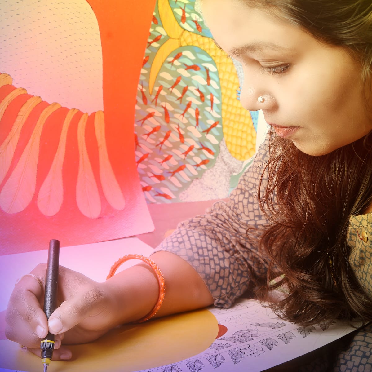 Daughter of Jangarh Singh Shyam, Japani Shyam working on her canvas
