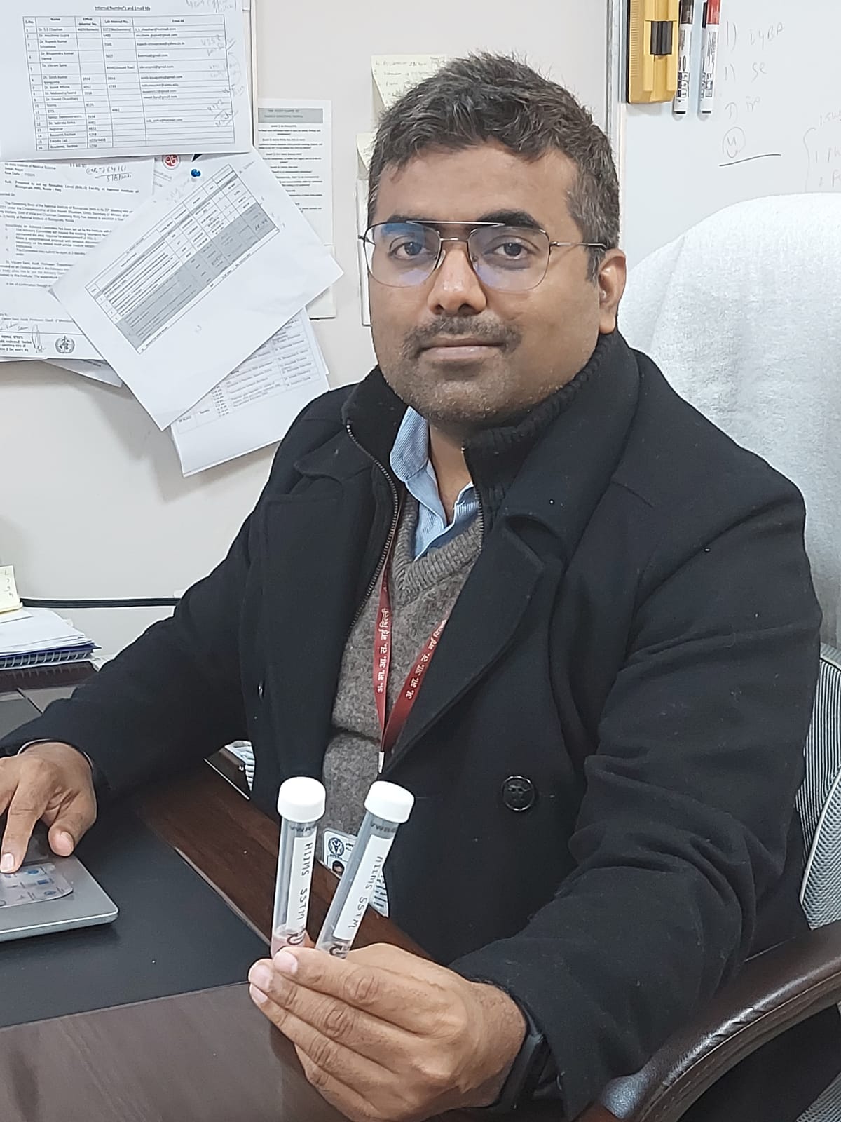 Dr Vikram with the new COVID-19 testing kit 