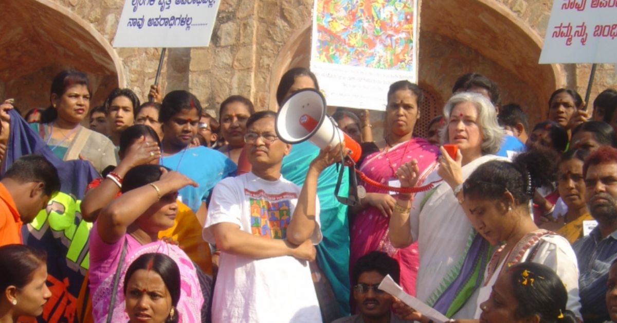 public health scientist dr smarajit jana with sex workers at a protest