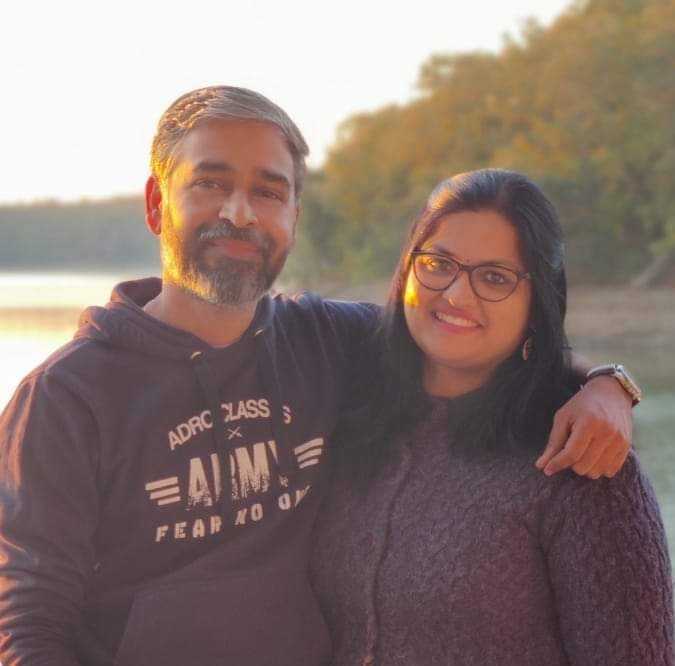 Farmer Prateek Sharma with his wife.