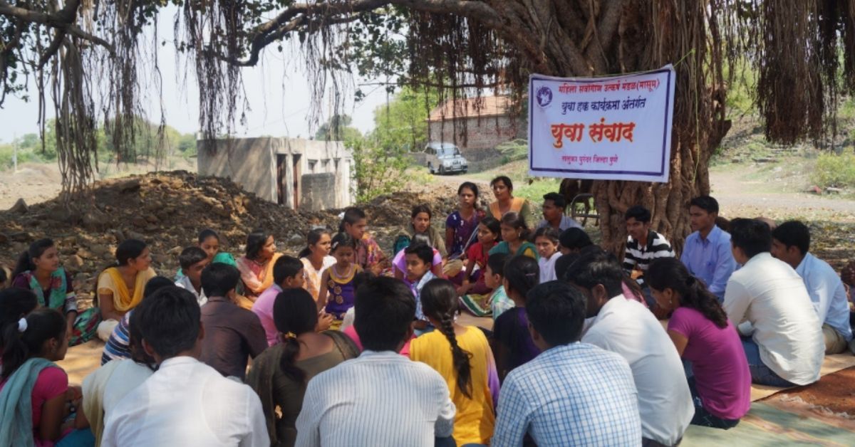 villagers in rural maharashtra sit for a seminar conducted by ngo masum