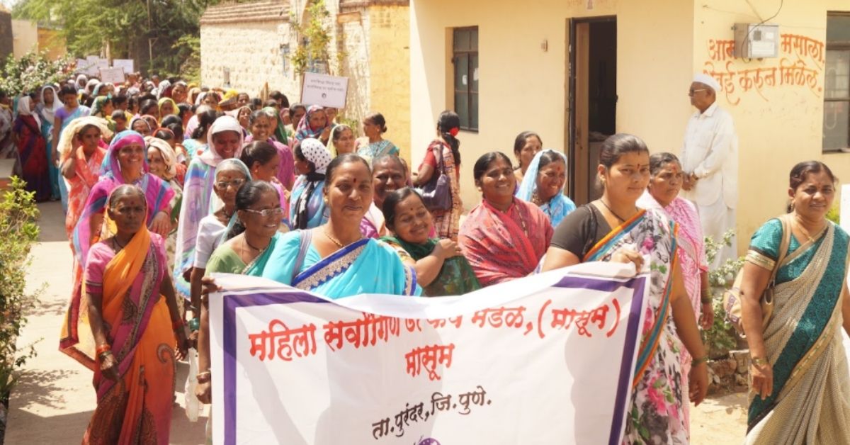 village women on march to protest for their rights