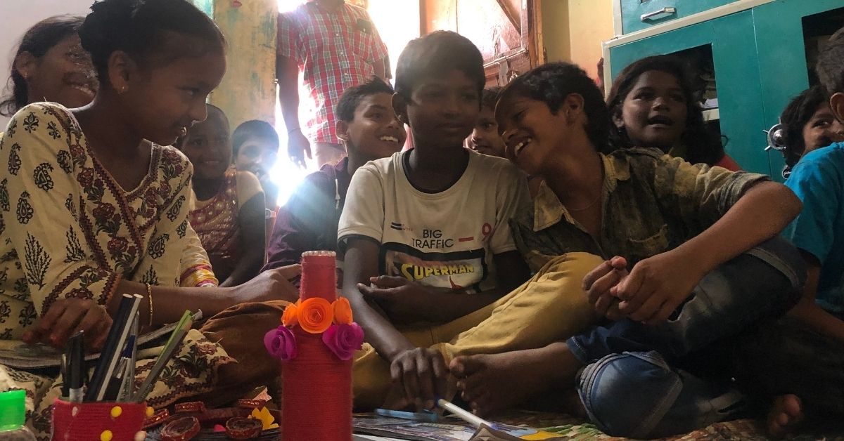 children sit and attend workshops hosted by youth organisation pravah