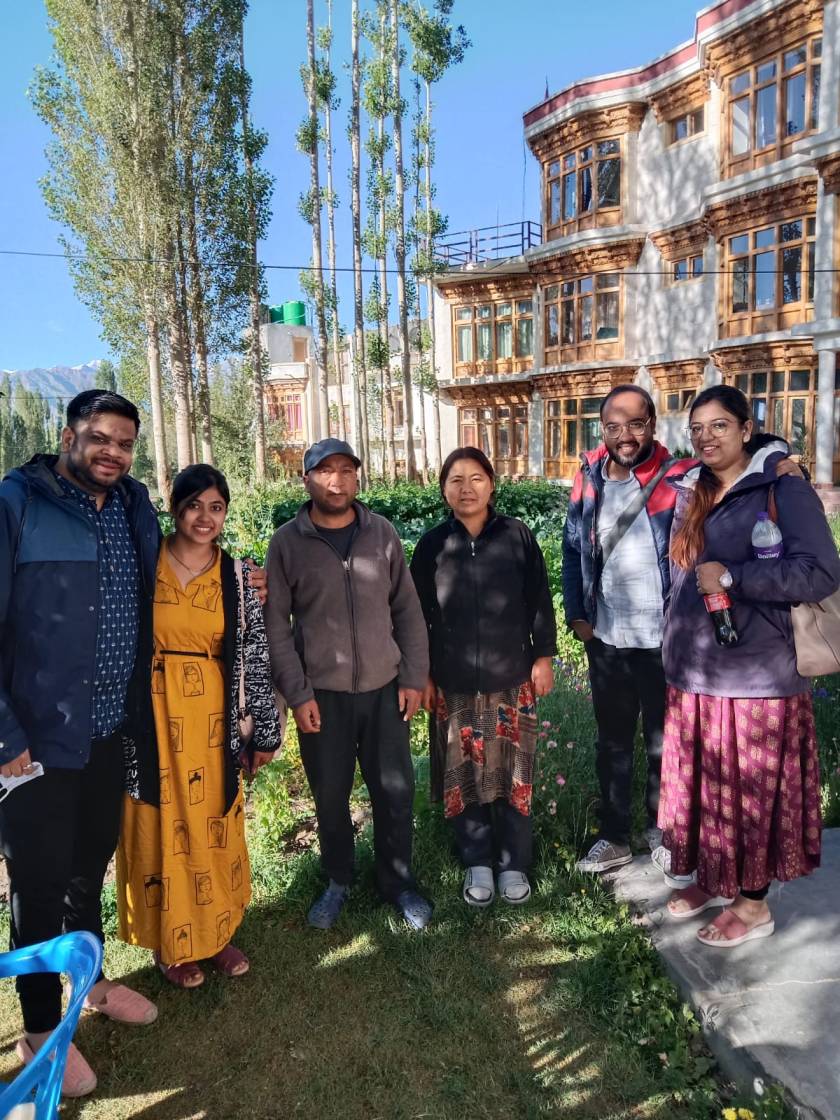 Dorjey Angchok and his wife Phunchok Dolma (centre) outside their guest house in Leh 