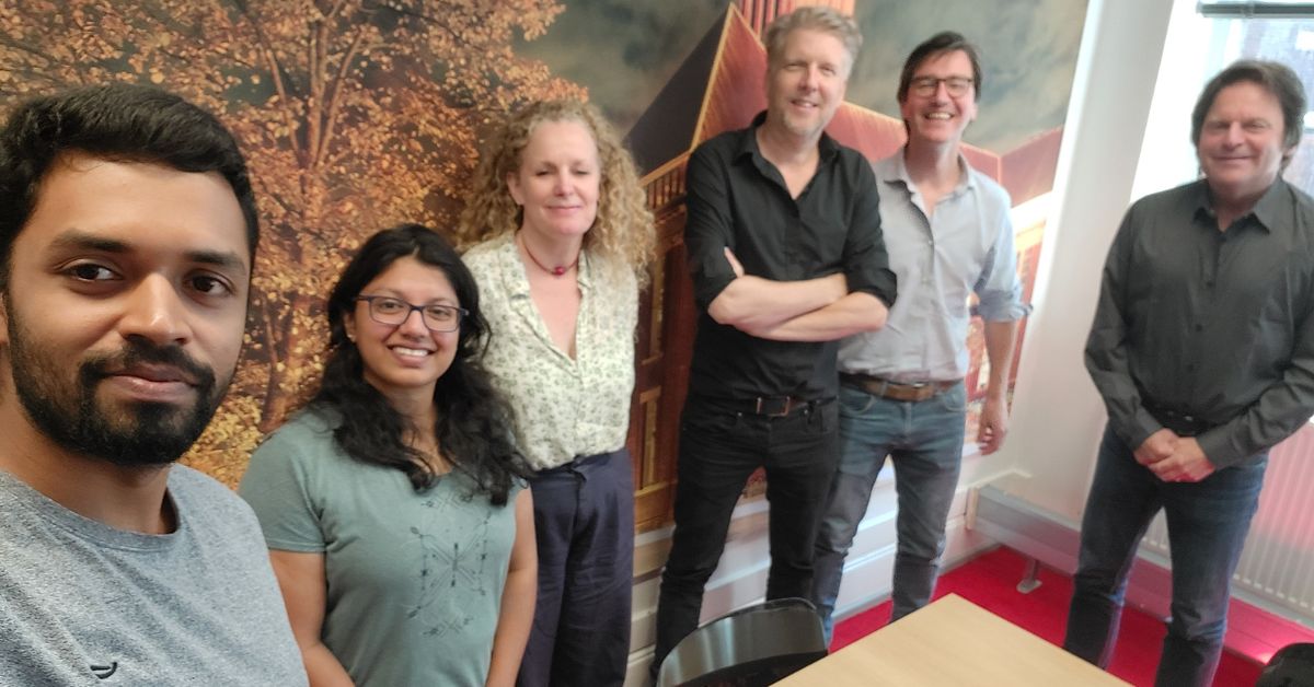 Nanma and Ben with their PhD supervisors.