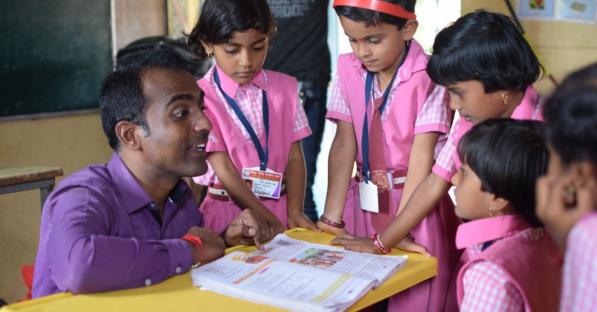 teacher with his students